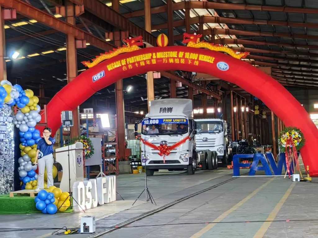 The 10th - anniversary Celebration of the Cooperation between FAW trucks and QSJ.Motors in the Philippines and the Ceremony for the Roll - off of the 10,000th Vehicle were Successfully Held